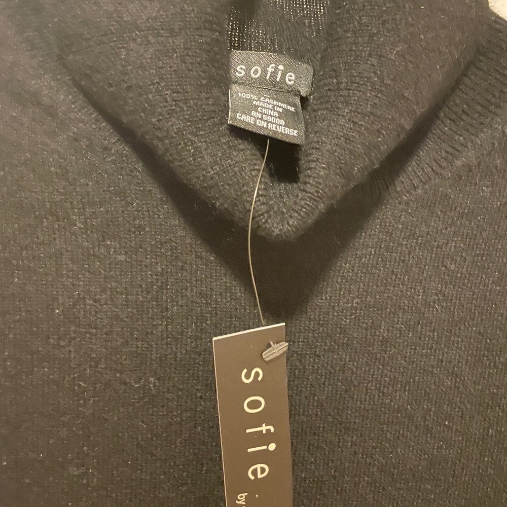 Black cashmere turtleneck sweater